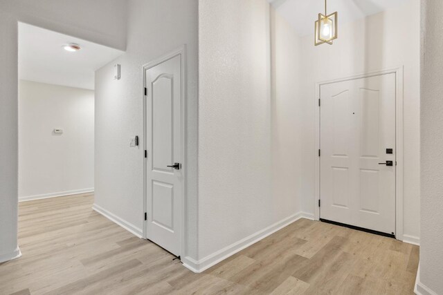 2540 E Seeger Ave, Visalia, CA 93292 - entrance foyer with light wood-style floors and baseboards