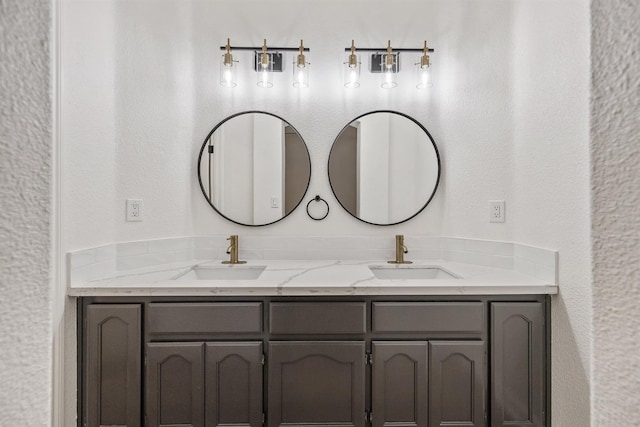 2540 E Seeger Ave, Visalia, CA 93292 - bathroom with double vanity and a textured wall