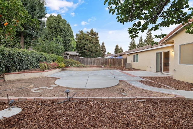 2540 E Seeger Ave, Visalia, CA 93292 - fenced backyard featuring a patio area