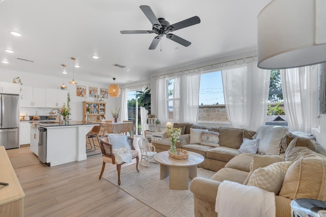 1961 Oak Ln, Clovis, CA 93611 - living area featuring light wood-style flooring, recessed lighting, and ceiling fan