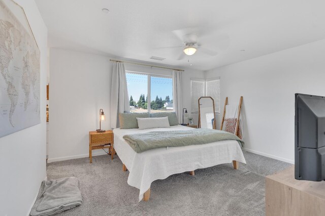 1961 Oak Ln, Clovis, CA 93611 - carpeted bedroom featuring baseboards and a ceiling fan