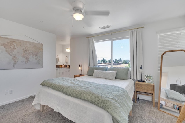 1961 Oak Ln, Clovis, CA 93611 - bedroom featuring carpet, ensuite bathroom, and a ceiling fan