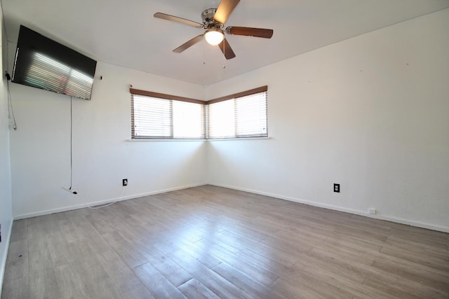521 Williams Ave, Madera, CA 93637 - unfurnished room featuring a ceiling fan and wood finished floors