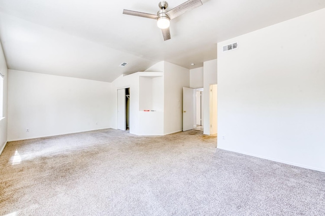5537 W Oswego Ave, Fresno, CA 93722 - unfurnished room with light carpet, a ceiling fan, and lofted ceiling