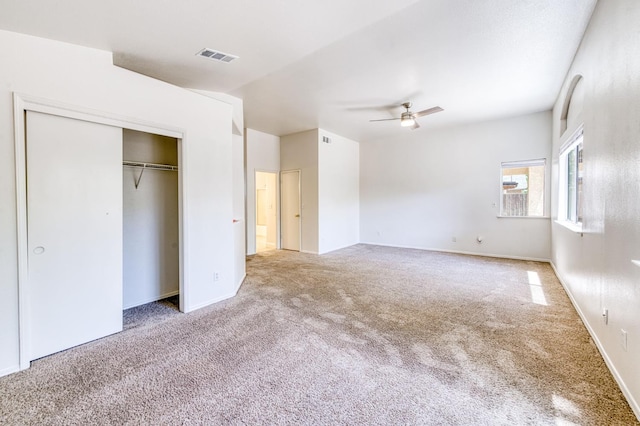 5537 W Oswego Ave, Fresno, CA 93722 - unfurnished bedroom featuring carpet, a closet, and a ceiling fan