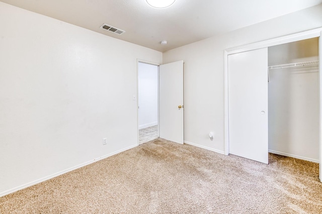 5537 W Oswego Ave, Fresno, CA 93722 - unfurnished bedroom featuring carpet floors and a closet