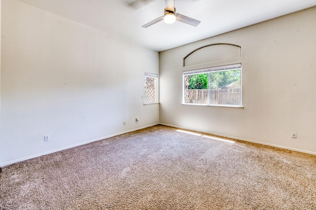 5537 W Oswego Ave, Fresno, CA 93722 - carpeted empty room featuring a ceiling fan and baseboards