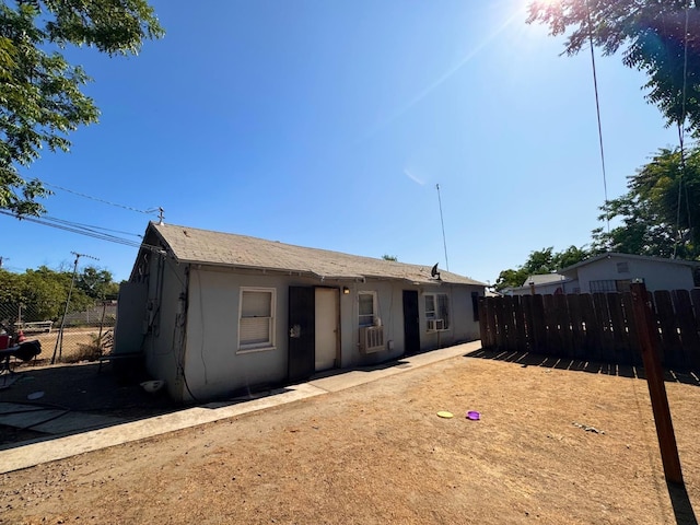 2465 S 11th St, Fresno, CA 93725 - rear view of property with stucco siding