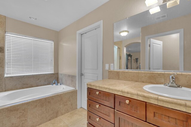 3017 W Oleander Ave, Fresno, CA 93706 - full bathroom featuring vanity, a bath, tile patterned floors, and an enclosed shower