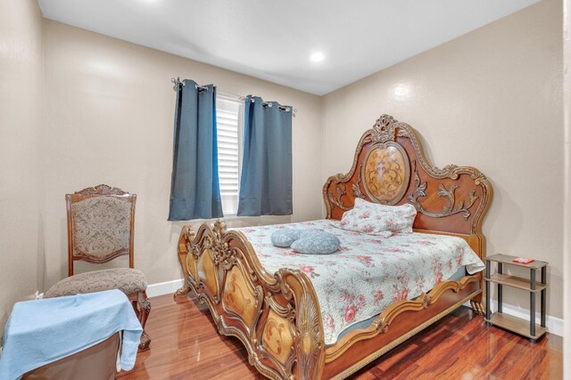 3017 W Oleander Ave, Fresno, CA 93706 - bedroom with wood finished floors and recessed lighting