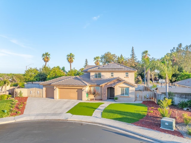 3017 W Oleander Ave, Fresno, CA 93706 - mediterranean / spanish-style house with a tile roof, a garage, stucco siding, and concrete driveway