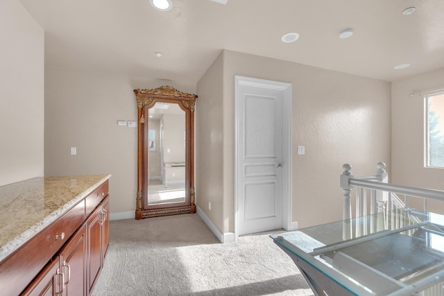 3017 W Oleander Ave, Fresno, CA 93706 - bathroom featuring baseboards and recessed lighting