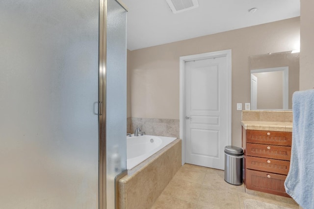 3017 W Oleander Ave, Fresno, CA 93706 - bathroom with a shower stall, vanity, a bath, and tile patterned flooring