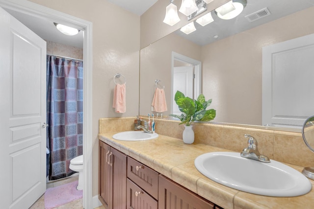 3017 W Oleander Ave, Fresno, CA 93706 - full bathroom with double vanity and a shower with curtain