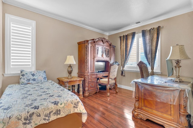 3017 W Oleander Ave, Fresno, CA 93706 - bedroom with wood finished floors, ornamental molding, and an office area