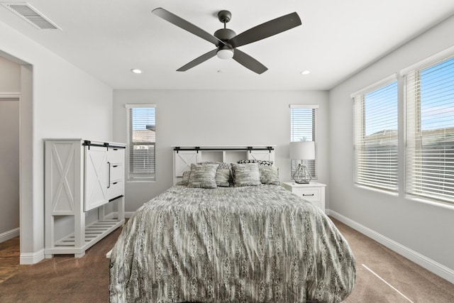 3430 Hermosa Ave, Clovis, CA 93619 - carpeted bedroom featuring multiple windows, recessed lighting, a ceiling fan, and a barn door