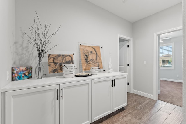 3430 Hermosa Ave, Clovis, CA 93619 - corridor with wood finished floors and baseboards