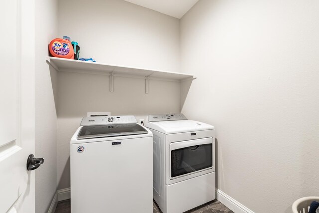 3430 Hermosa Ave, Clovis, CA 93619 - washroom featuring separate washer and dryer and baseboards