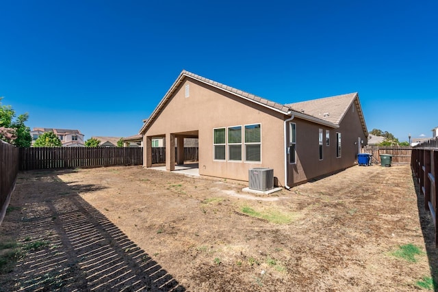 3430 Hermosa Ave, Clovis, CA 93619 - rear view of house featuring a fenced backyard, stucco siding, and a tiled roof