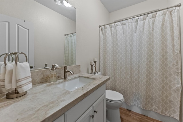 7387 E Robinson Ave, Fresno, CA 93737 - bathroom featuring vanity and wood finished floors