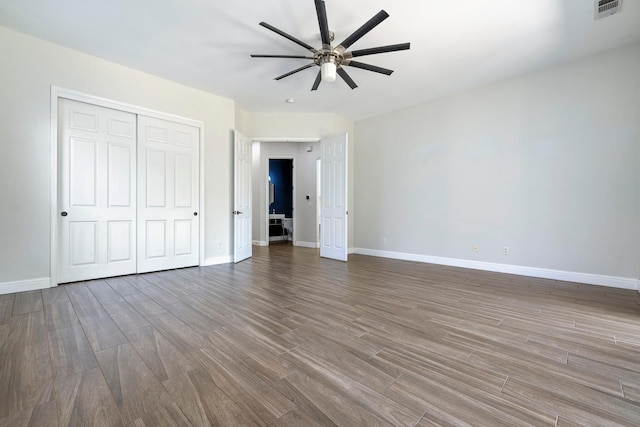 1552 N Gateway Ave, Clovis, CA 93619 - unfurnished bedroom featuring wood finished floors, a closet, and ceiling fan