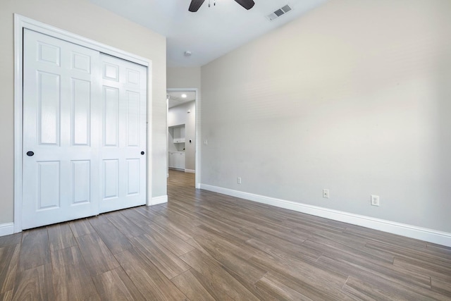 1552 N Gateway Ave, Clovis, CA 93619 - unfurnished bedroom featuring dark wood-style flooring, a closet, and ceiling fan