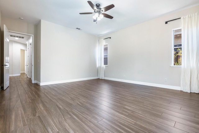 1552 N Gateway Ave, Clovis, CA 93619 - unfurnished room with a ceiling fan and wood finished floors
