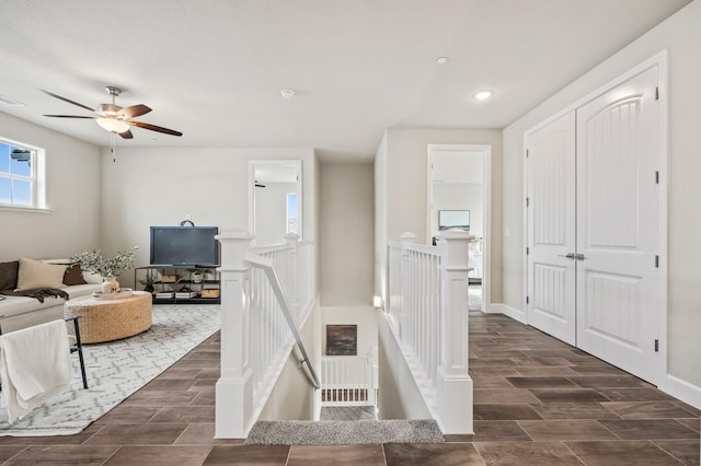 974 Talus Way S, Madera, CA 93636 - hall with an upstairs landing, wood tiled floors, and recessed lighting