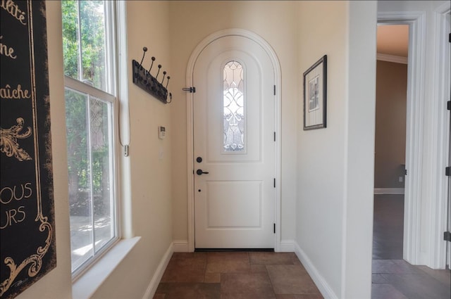 1682 N Dutch Ave, Clovis, CA 93619 - foyer entrance featuring arched walkways and dark stone finish flooring