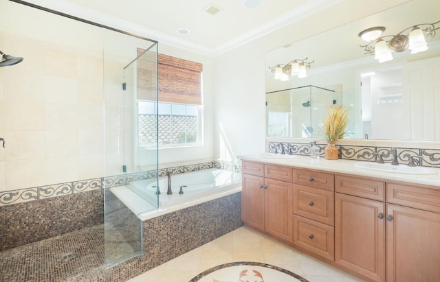 1682 N Dutch Ave, Clovis, CA 93619 - full bathroom featuring a stall shower, a garden tub, double vanity, tile patterned floors, and ornamental molding