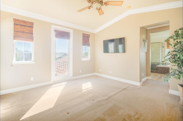 1682 N Dutch Ave, Clovis, CA 93619 - empty room with light carpet, healthy amount of natural light, ornamental molding, and vaulted ceiling