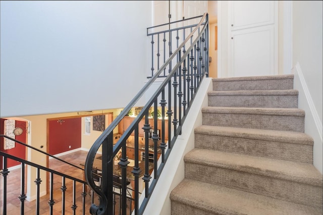 1682 N Dutch Ave, Clovis, CA 93619 - stairs with baseboards and a high ceiling