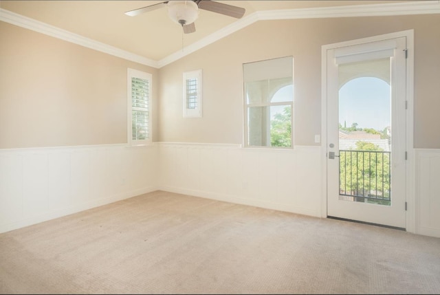 1682 N Dutch Ave, Clovis, CA 93619 - carpeted spare room with a wainscoted wall, crown molding, a ceiling fan, and vaulted ceiling