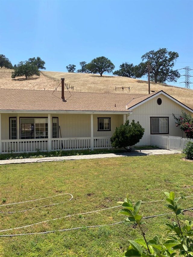 5288 N Piedra Rd N, Sanger, CA 93657 - view of front of property with covered porch and a shingled roof