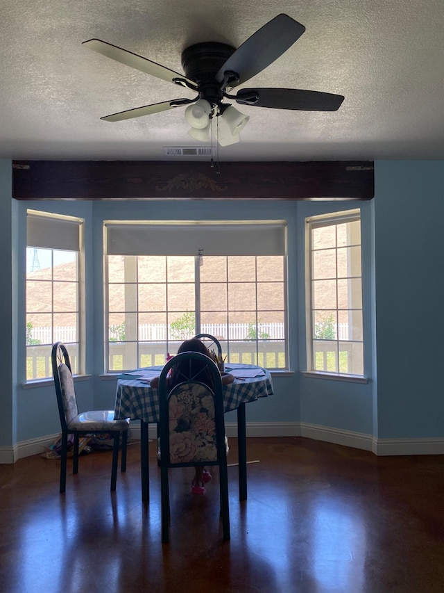 5288 N Piedra Rd N, Sanger, CA 93657 - dining space with a textured ceiling and ceiling fan