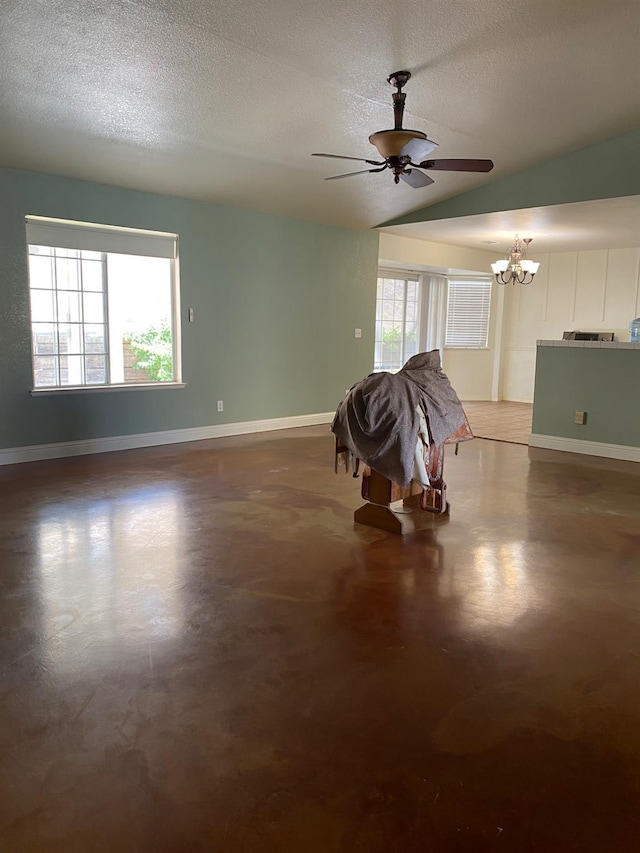 5288 N Piedra Rd N, Sanger, CA 93657 - spare room featuring a chandelier, a textured ceiling, ceiling fan, and lofted ceiling