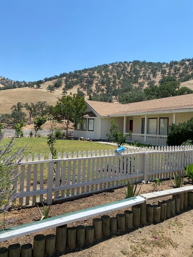 5288 N Piedra Rd N, Sanger, CA 93657 - single story home with a fenced front yard