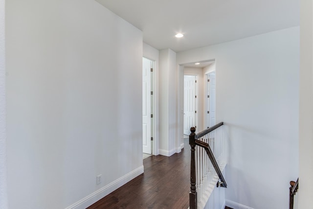 1090 Clara Ave, Fowler, CA 93625 - corridor with an upstairs landing, dark wood-type flooring, and recessed lighting