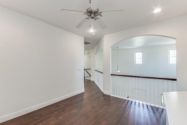 1090 Clara Ave, Fowler, CA 93625 - unfurnished room featuring wood finished floors, a ceiling fan, arched walkways, and recessed lighting