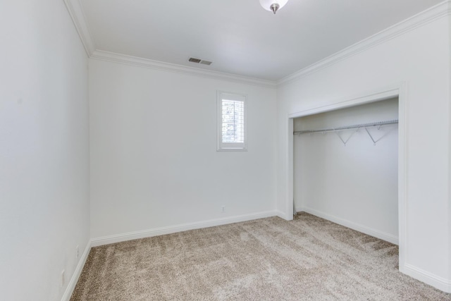 1090 Clara Ave, Fowler, CA 93625 - unfurnished bedroom with carpet, crown molding, and a closet