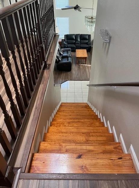6324 N Brix, Fresno, CA 93722 - staircase with a ceiling fan and tile patterned flooring
