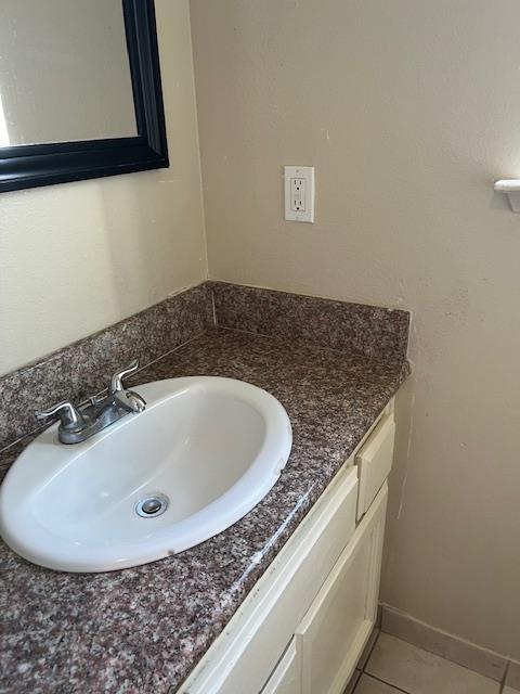 6324 N Brix, Fresno, CA 93722 - bathroom featuring vanity and tile patterned flooring