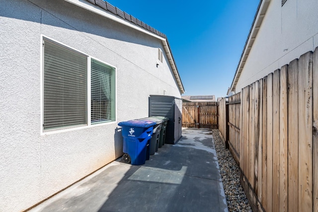 4146 Dennis Ave, Clovis, CA 93619 - view of property exterior featuring a patio area, a fenced backyard, and stucco siding