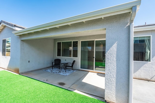 4146 Dennis Ave, Clovis, CA 93619 - rear view of property featuring a patio area and stucco siding