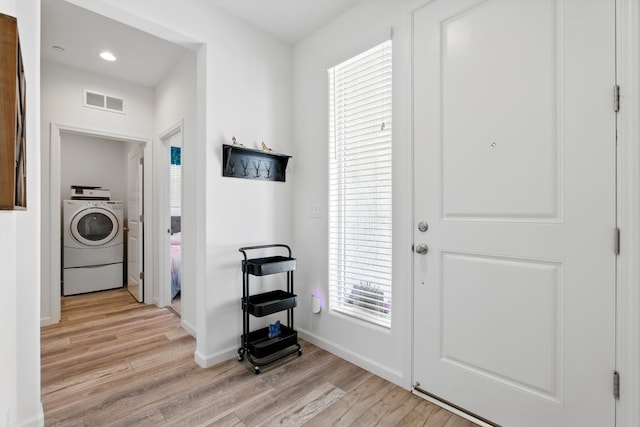 4146 Dennis Ave, Clovis, CA 93619 - entryway featuring washer / dryer, light wood finished floors, and recessed lighting