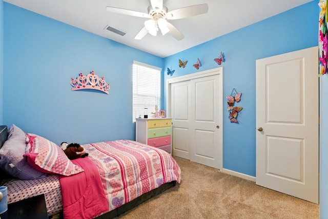 4146 Dennis Ave, Clovis, CA 93619 - bedroom with light colored carpet, a closet, and a ceiling fan