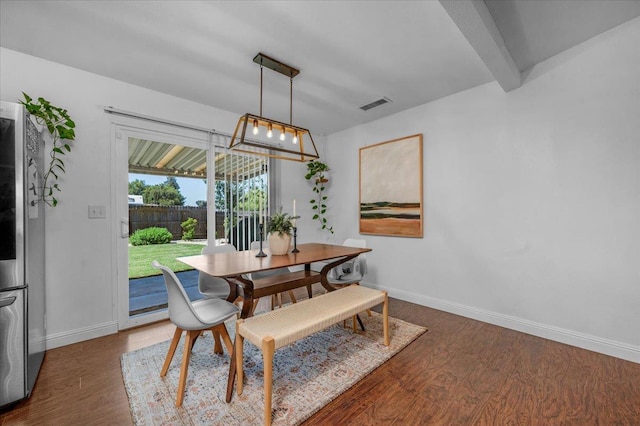 1448 Ashcroft Ave, Clovis, CA 93611 - dining space with wood finished floors and beam ceiling