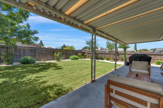 1448 Ashcroft Ave, Clovis, CA 93611 - fenced backyard with a patio area