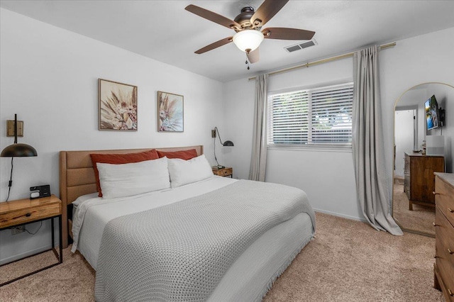 1448 Ashcroft Ave, Clovis, CA 93611 - bedroom featuring light colored carpet, arched walkways, and a ceiling fan
