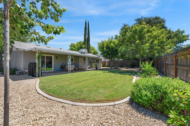 1448 Ashcroft Ave, Clovis, CA 93611 - fenced backyard featuring a patio